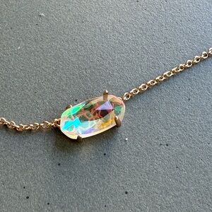 Kendra Scott Necklace. Iridescent sparkle pendant on rose gold chain.